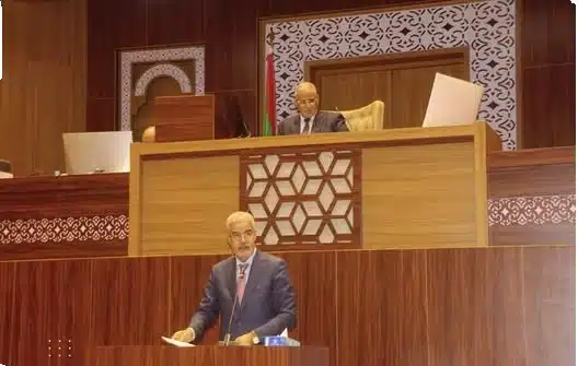 portrait du ministre de l'Économie et des Finances s’exprimant à l’Assemblée.